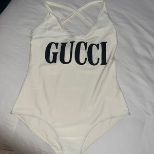 One piece Gucci swim suit brand new never worn